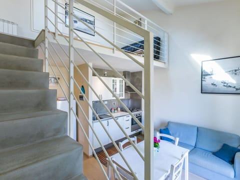 Couch, Building, Flooring, Floor, Comfort, Picture Frame, Stairs, Ceiling, Wood, Condominium