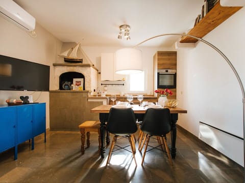 Sky, Property, Furniture, Table, Azure, Chair, Building, Window, Shade, Architecture