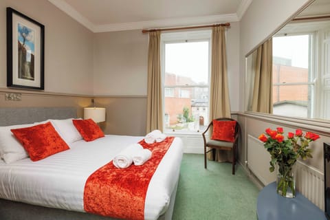 Double Room, Courtyard View | Iron/ironing board, free WiFi