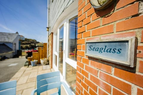The sign for Seaglass on the front of the property