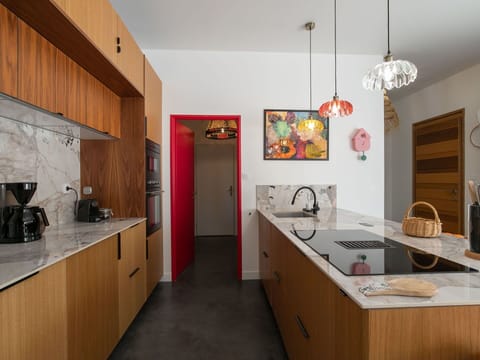 Kitchen, Furniture, Countertop, Interior Design, Flooring, Kitchen Appliance, Wall, Light Fixture, Wood, Ceiling