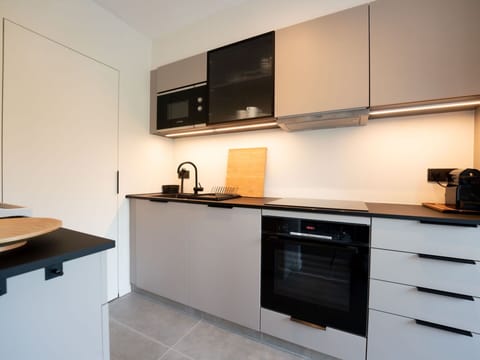 Cabinetry, Countertop, Kitchen Appliance, Kitchen, Building, Kitchen Stove, Wood, Home Appliance, Interior Design, Sink