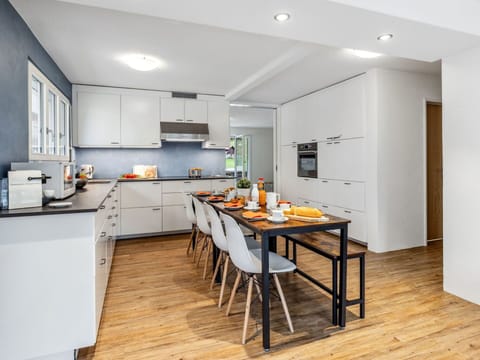 Furniture, Kitchen, Interior Design, Flooring, Countertop, Cabinetry, Wood, Kitchen Appliance, Floor, Ceiling