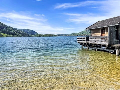 Cloud, Water, Sky, Water Resources, Building, Mountain, Azure, Natural Landscape, House, Lake