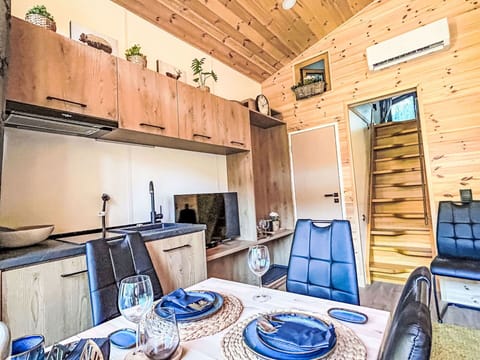 Property, Furniture, Blue, Table, Azure, Wood, Interior Design, Cabinetry, Kitchen, Floor