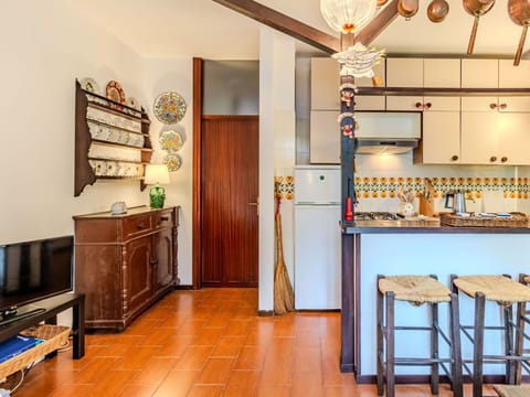 Cabinetry, Property, Furniture, Table, Wood, Interior Design, Countertop, Lighting, Flooring, Floor