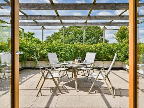 Table, Furniture, Property, Chair, Plant, Outdoor Table, Shade, Outdoor Furniture, Building, Wood