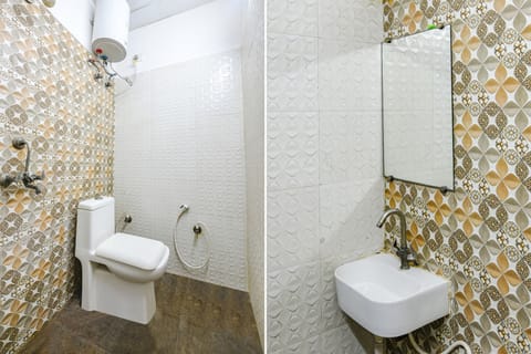 Deluxe Room | Bathroom | Shower, rainfall showerhead, towels