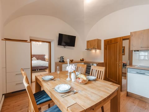 Table, Furniture, Property, Cabinetry, Wood, Chair, Interior Design, Flooring, Countertop, Wood Stain