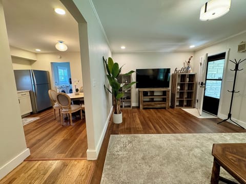Split view of living room into the kitchen.
