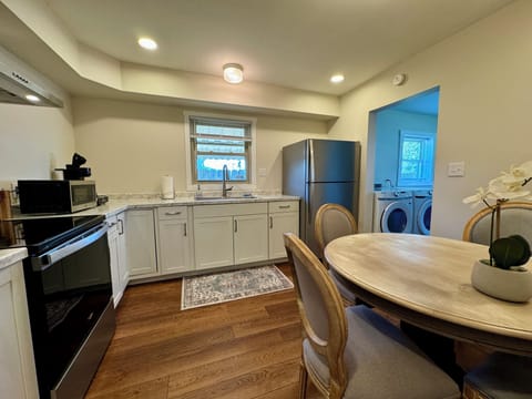Dining table for four located in the kitchen.