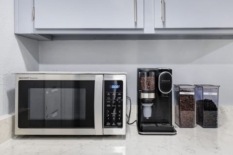 Brew coffee maker with whole beans + pods