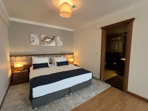 Family Suite, City View | Desk, iron/ironing board, free WiFi, bed sheets