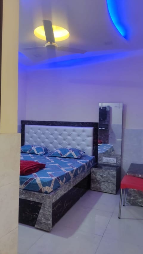 Deluxe Quadruple Room, City View | Free WiFi, bed sheets