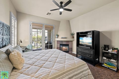 Luxury Studio Suite, 1 King Bed, Fireplace, Pool View | In-room safe, individually decorated, desk, laptop workspace