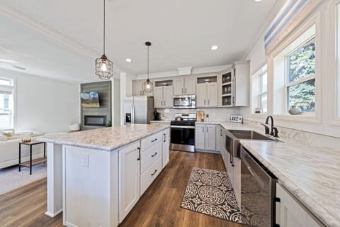 Clean and bright kitchen with dishwasher