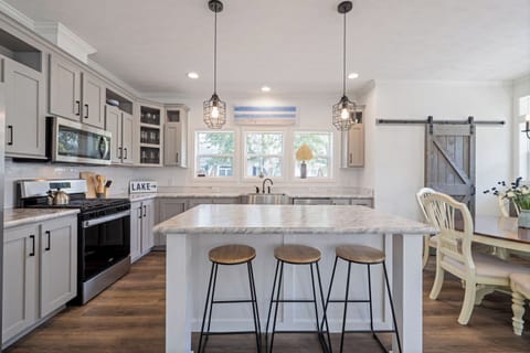 Kitchen with island bar top