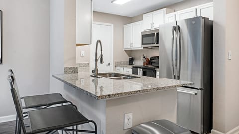 Apartment, 2 Bedrooms, 2 Bathrooms | Private kitchen | Full-size fridge, microwave, oven, stovetop