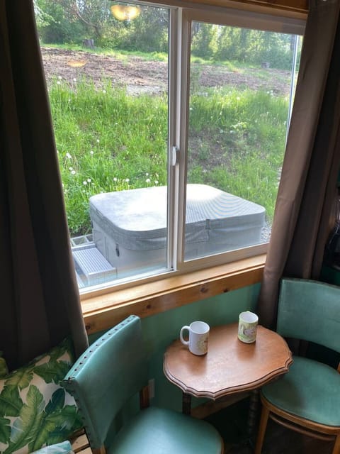 There's the hot tub!  Right outside that window (but you might want to use the French doors going out to the deck.   ;-)