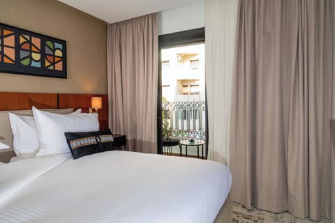 Double Room, Balcony, City View | In-room safe, desk, laptop workspace, blackout drapes