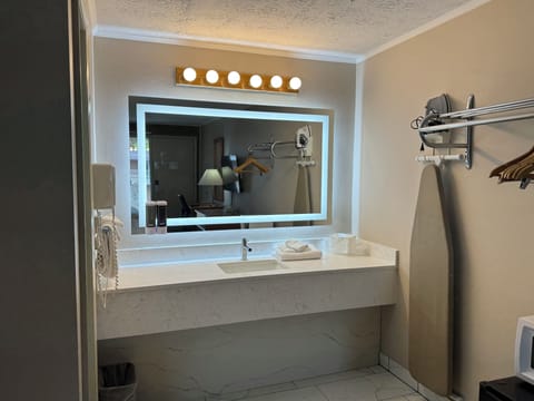 Deluxe Double Room, 2 Queen Beds, Refrigerator & Microwave | Bathroom sink