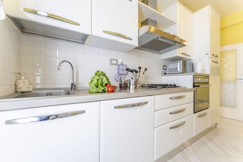 Apartment | Private kitchen | Full-size fridge, microwave, oven, stovetop