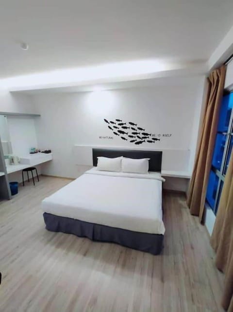 Deluxe Double Room, City View | In-room safe, desk, laptop workspace, blackout drapes