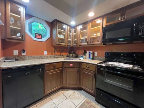 The warm, inviting kitchen offers ample space & every home comfort