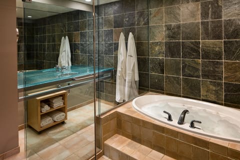 Combined shower/tub, designer toiletries, hair dryer, bathrobes