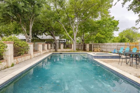 Dive into the sparkling pool and unwind in the hot tub along the San Marcos Rive