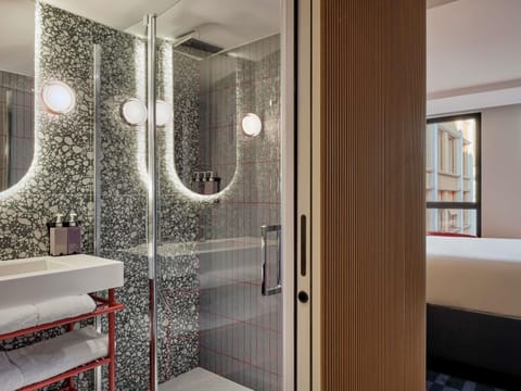 TRIBE Essential | Premium bedding, in-room safe, blackout drapes, soundproofing