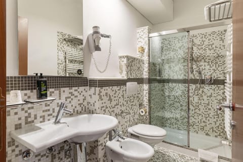 Free toiletries, hair dryer, bidet, towels