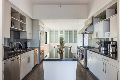 Spacious kitchen with double sinks and two dishwashers