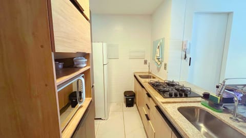 Luxury Apartment | Private kitchen | Stovetop, cookware/dishes/utensils