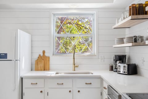 Unit 41: The bright, airy kitchen offers ample space & all the comforts of home