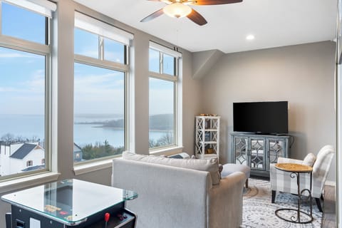 The sunroom offers a picturesque backdrop for enjoying movies & gaming