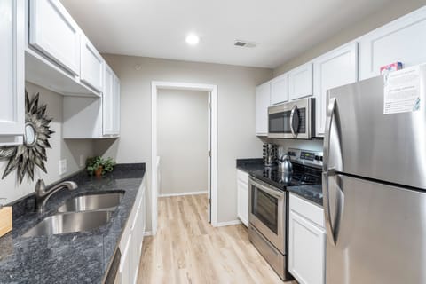 The airy kitchen offers ample space and all the comforts of home