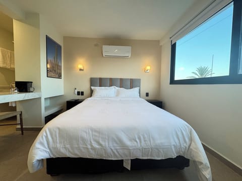 Deluxe Double Room | In-room safe, blackout drapes, iron/ironing board, free WiFi