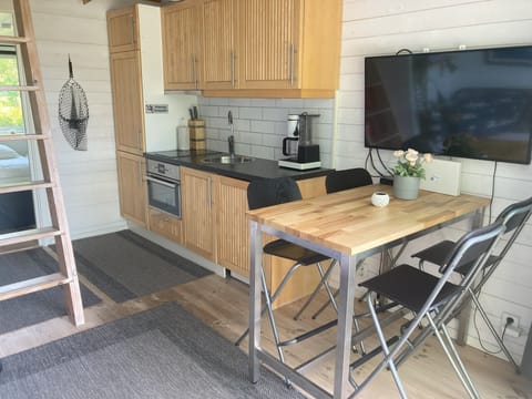 Family Cabin, Sea View | Private kitchen | Electric kettle, toaster, highchair