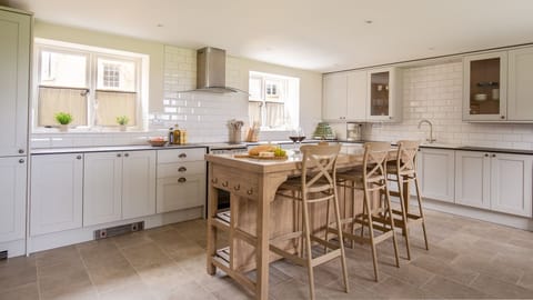 The well-equipped kitchen is a stylish space