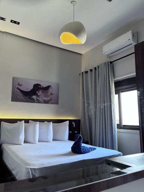 Deluxe Double or Twin Room, City View | Soundproofing, iron/ironing board, free WiFi