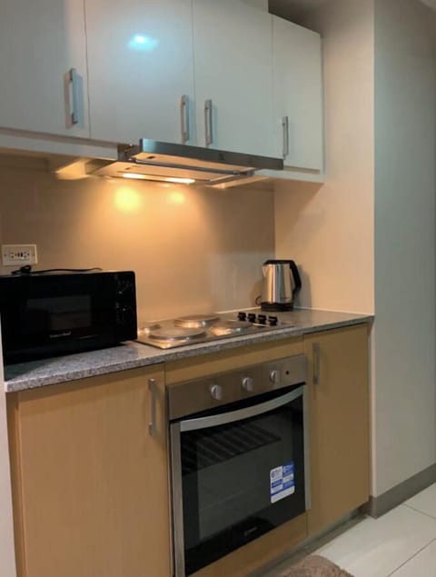 Comfort Apartment, 2 Bedrooms | Private kitchen | Fridge, microwave, stovetop, rice cooker