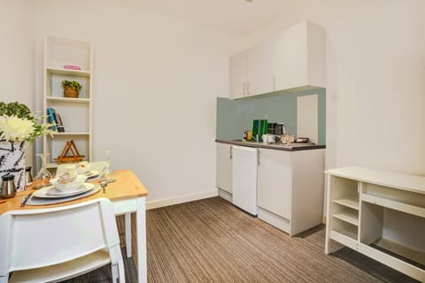 Standard Studio, 1 Twin Bed | Private kitchen | Fridge, stovetop, coffee/tea maker, electric kettle