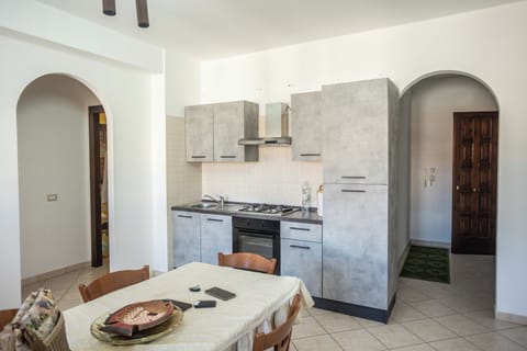 Apartment, 2 Bedrooms, Balcony | Private kitchen | Fridge, oven, stovetop, cookware/dishes/utensils