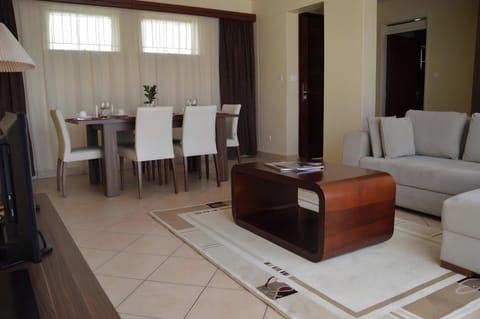 Apartment, 2 Bedrooms | Living area | 32-inch flat-screen TV with satellite channels, TV