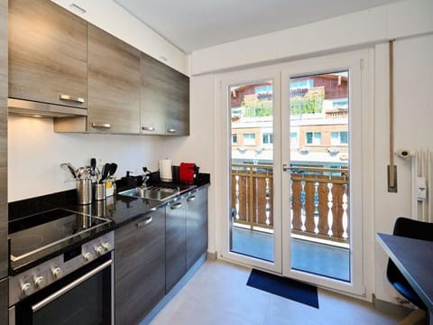 Cabinetry, Property, Window, Countertop, Kitchen Appliance, Kitchen, Kitchen Stove, Interior Design, Wood