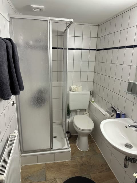 Standard Triple Room, City View | Bathroom | Shower, hair dryer, towels, soap