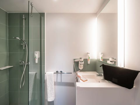 Shower, eco-friendly toiletries, hair dryer, towels