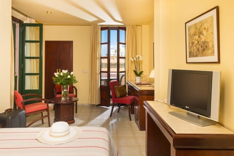 Junior Suite, Balcony | In-room safe, blackout drapes, bed sheets