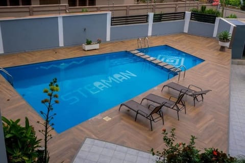 2 outdoor pools, sun loungers